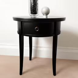 the side table has two drawers on one