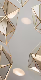 many gold - plated objects are seen against a gray background