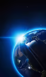 a blue earth with light from a star above