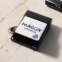 a stamp pad sitting on top of a wooden counter