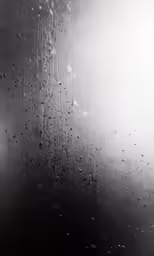 rain is falling off the window, making it look like it could be raining