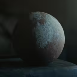 the black ball sits in the dark alone