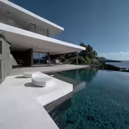the modern home is overlooking the ocean and mountains
