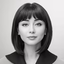 black and white photograph of a woman with a shoulder length bob