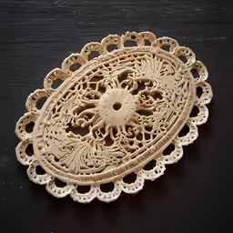 a large wooden plate with flowers and a pattern