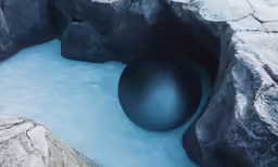 a rock formation with a large ball in the middle