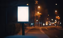 an empty signpost sitting on the side of a road