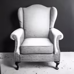 a white chair with nail polishing on it