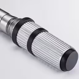 an invertible camera with a silver case and black lid