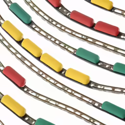 a close up of a set of different colored combs