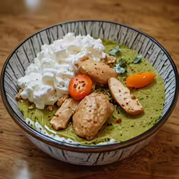 a large bowl filled with a variety of food