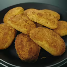 small pancakes are fried and ready to be cooked
