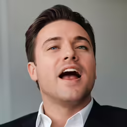 a man singing with open mouth in front of a window