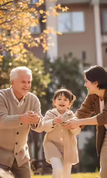 an older man shaking hands with two small children