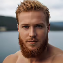 a man with a red beard wearing a white shirt