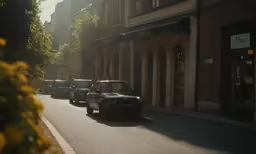 a row of cars parked along a street