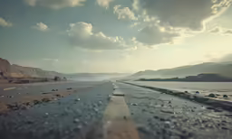a view of the ocean and road on a sunny day