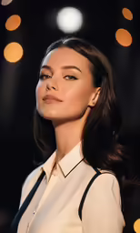 the actress is posing for a picture wearing her golden necklace
