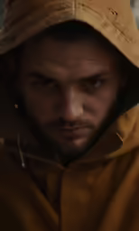 a close up of a man in a hat