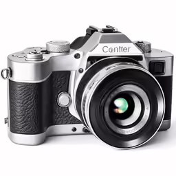 a silver camera sitting on top of a white counter