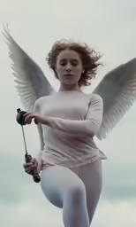 an angel in a white suit with wings and a chain