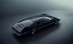a black car on a dark background