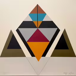 an abstract geometric artwork hangs on the wall,an image of a painting that looks like abstract artwork,a painting with lots of different colored shapes,a very nice artwork on a big white wall,a painting made up of triangles with red, orange and blue centers