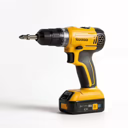 a yellow cordless drill is shown on a white surface