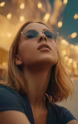 woman with sunglasses on staring at lights