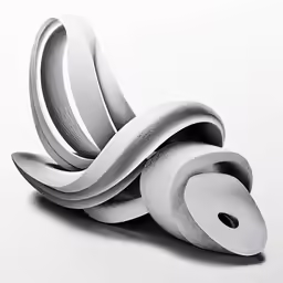 a white sculpture that is shaped like an egg