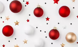 red and gold christmas ornaments on white background