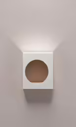 a white square light fixture in a wall