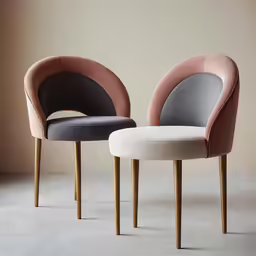 a couple of chairs that are next to each other