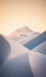 the snowy mountain range is shown in the foreground