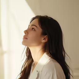 the woman is posing for a picture wearing a white shirt