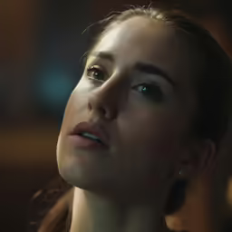 a woman with a serious look on her face
