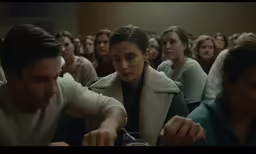 a group of people that are looking at something