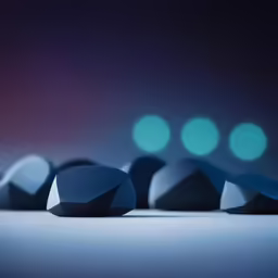 a group of dark spheres sitting on top of a floor