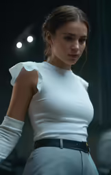 a model wears white in a fashion show