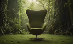 a chair sits in front of an area with trees