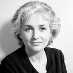 a black and white photo of a woman