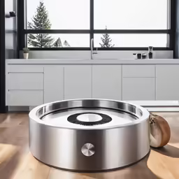a modern kitchen with a stainless steel stove and round sink