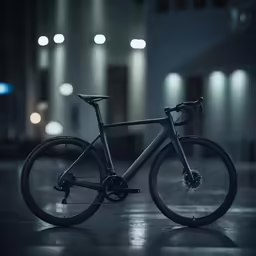 a bike with a bike frame is sitting in the dark