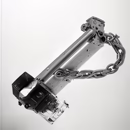 a black and white photograph with chains attached to it