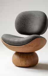 a black and wooden chair sitting on top of a white surface