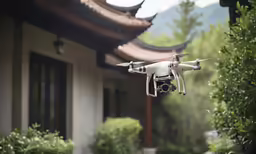 a small camera flies over a house