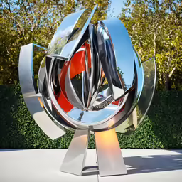 the art center globe sculpture has many circular objects