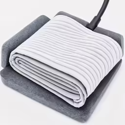 an image of a blanket with a handle on the pillow