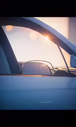 the sun is shining through a side view window