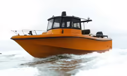 an orange boat with black and white stripes